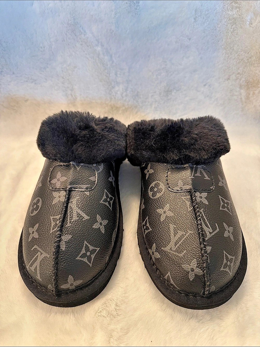 NWOT UGG Tasman Graphic Monogram Black Leather and Faux Fur Slip Ons